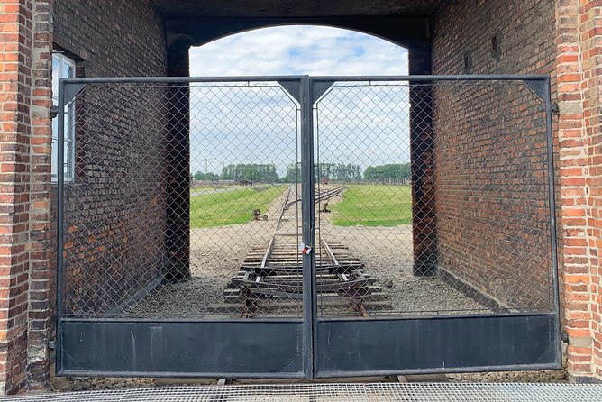 Auschwitz-Birkenau guided tour from Krakow with a private transport - Entering Auschwitz I with an English-speaking guide