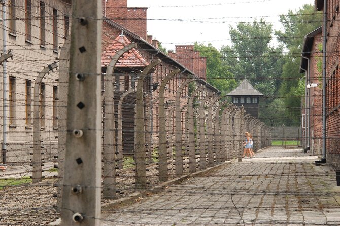Auschwitz & Birkenau Live Guide Tour Entrance Ticket - Auschwitz I, the brick barracks and the first hard facts