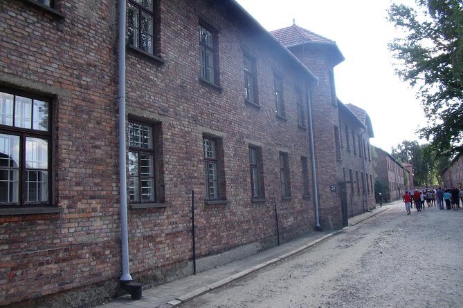 Auschwitz Tours Memorial and Museum Guided Tour from Krakow - What the $74.65 price covers