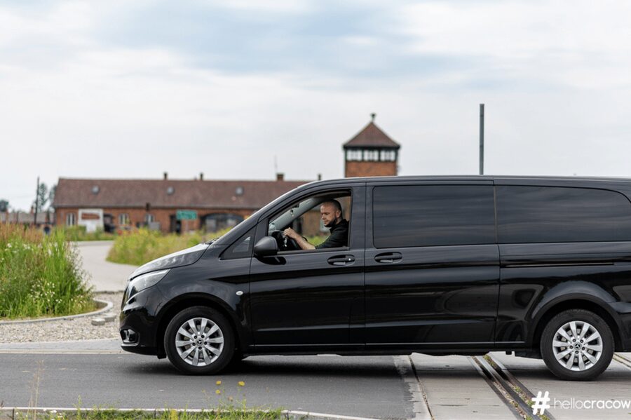 From Krakow: Auschwitz-Birkenau Guided Tour Guaranteed Time - Entering Auschwitz I through the famous gate