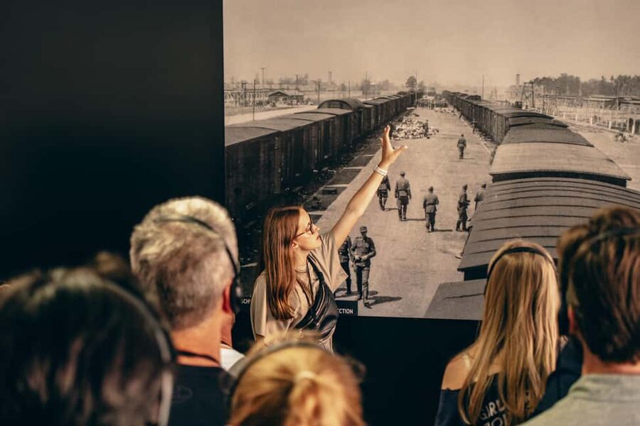 From Krakow: Auschwitz-Birkenau Guided Tour & Pickup - Auschwitz I and the Arbeit Macht Frei entrance