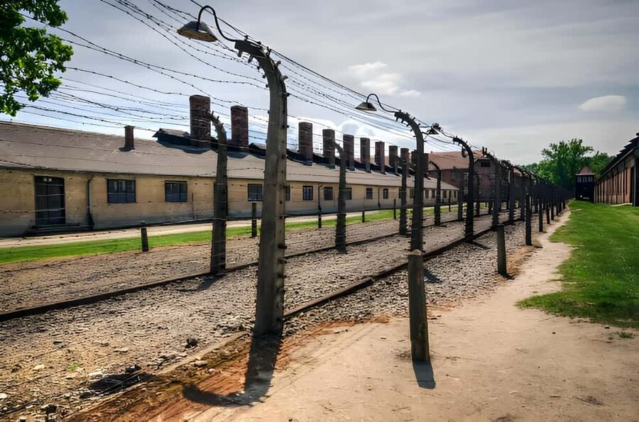 From Krakow: Auschwitz & Birkenau Guided Tour with Pick up - Birkenau: The Railway Ramp and the Camp’s Scale