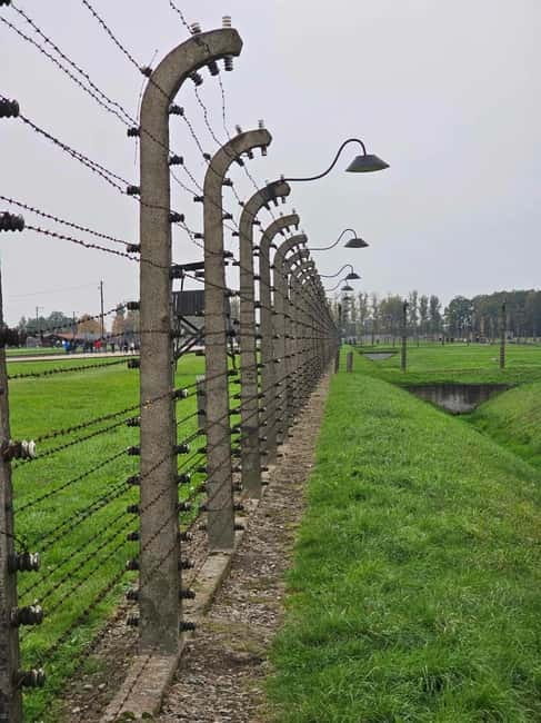 From Krakow: Auschwitz-Birkenau Guided Tour with Pickup - Auschwitz I: barracks, exhibits, and difficult evidence