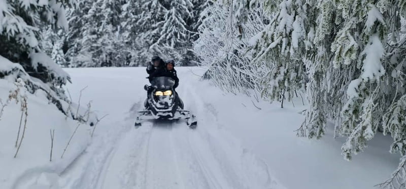 From Krakow: Snowmobile, Zakopane & Chochołowskie Baths - Chochołowskie Thermal Baths at day’s end