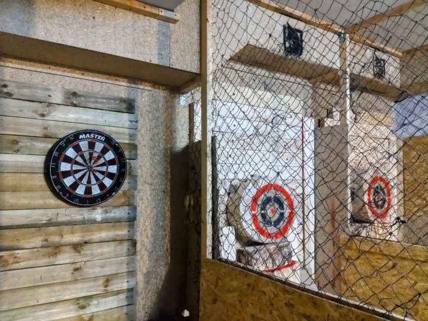 Krakow: Axe Throwing Fun - Trick shots, nail hammering, and Viking props