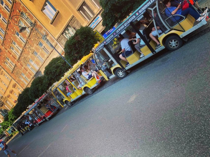 Krakow: City Sightseeing Tour Eco Electric Buggy Golf Cart - The guides, audio, and group atmosphere