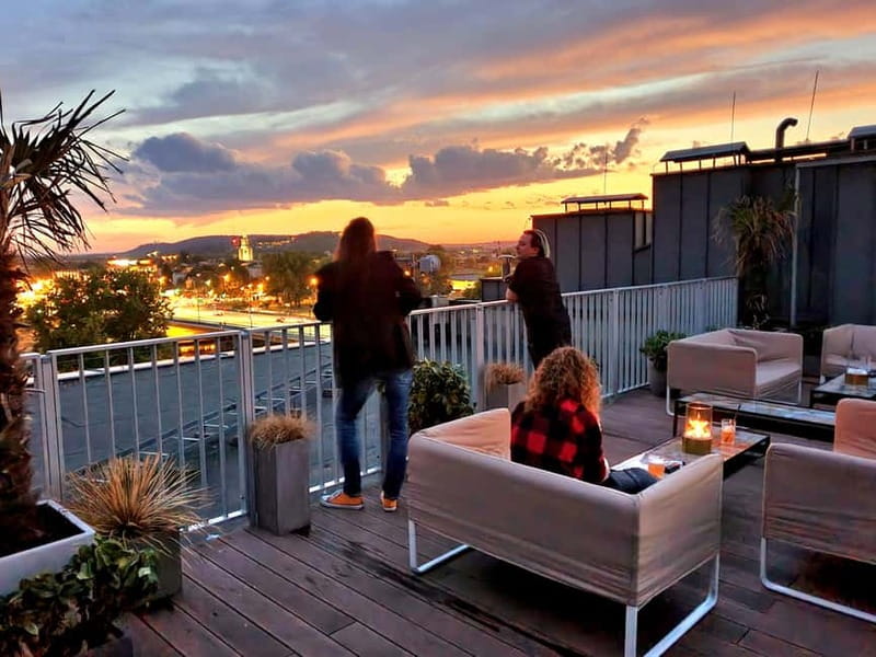 Krakow: Hidden Rooftop Bar Reservation with 1 Cocktail - The 6th-floor terrace and its city views