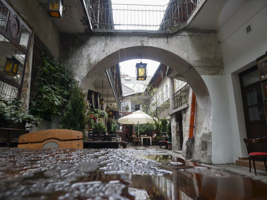 Krakow: Jewish Quarter and Schindler's Factory Guided Tour - The modern Kazimierz: cafes, art, and a changed mood