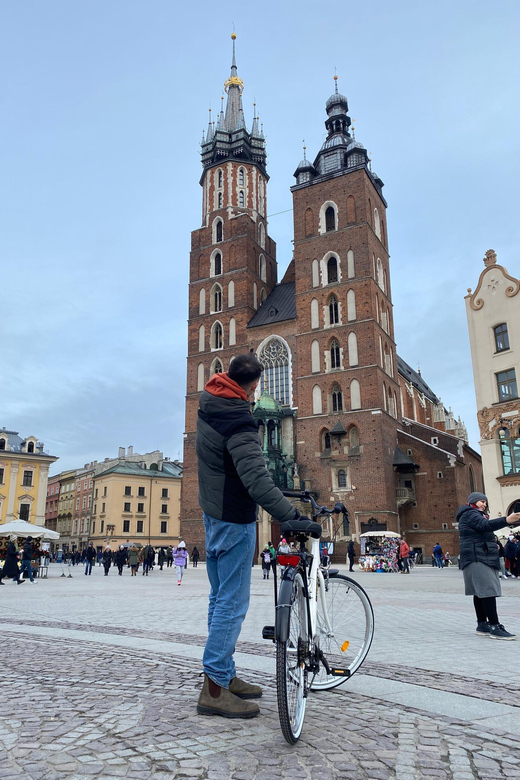 Krakow: Old Town and Kazimierz Guided Bike Tour - Crossing into Kazimierz at Wolnica Square