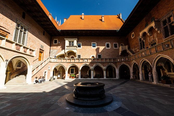 Krakow Old Town Guided Walking Tour - Price, group size, and booking risks