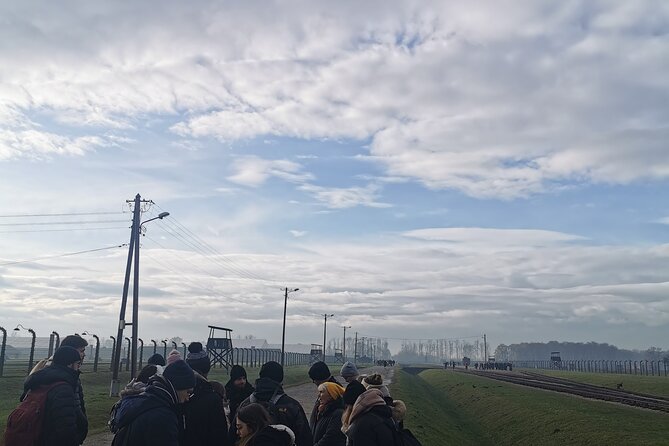 Krakow to Auschwitz Birkenau Guided Tour with Transfer and Ticket - Transport, timing, and group size